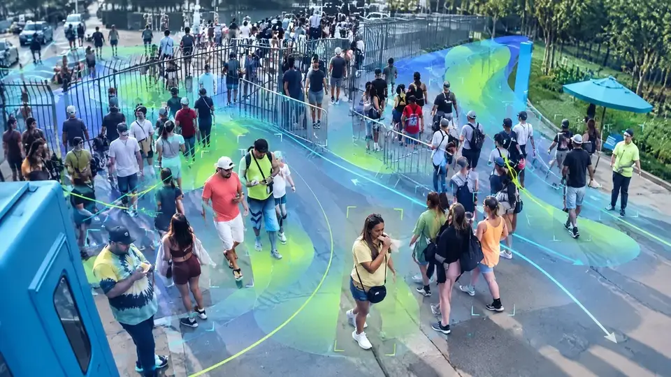 Event entrance with people walking and a flow heat map overlaid