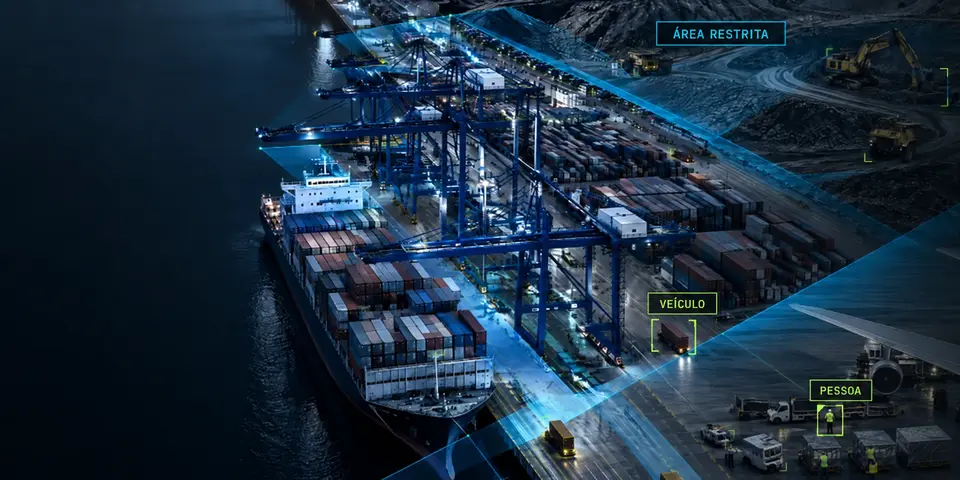 Imagem de um terminal portuário vista por uma câmera, com pessoa, veículo e área restrita marcados pela inteligência artificial